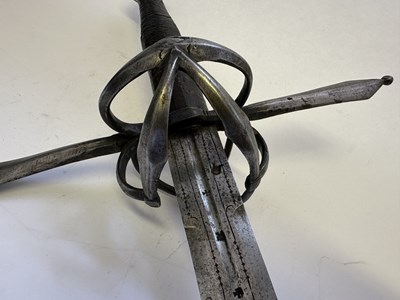 Lot 26 - A GERMAN HAND-AND-A HALF SWORD, CIRCA 1600-20
