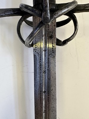 Lot 26 - A GERMAN HAND-AND-A HALF SWORD, CIRCA 1600-20