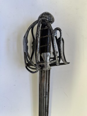 Lot 49 - AN ENGLISH BASKET-HILTED BACKSWORD, CIRCA 1650-90