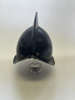 Lot 79 - A GERMAN COMB MORION, EARLY 17TH CENTURY
