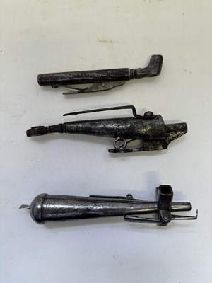Lot 83 - TWO GERMAN COMBINED POWDER-FLASKS, WHEEL-LOCK SPANNERS AND TURNSCREWS, 17TH CENTURY