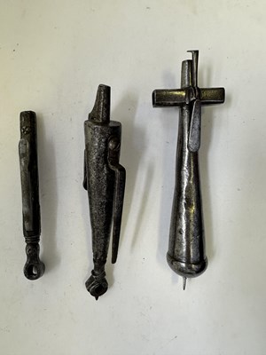 Lot 83 - TWO GERMAN COMBINED POWDER-FLASKS, WHEEL-LOCK SPANNERS AND TURNSCREWS, 17TH CENTURY