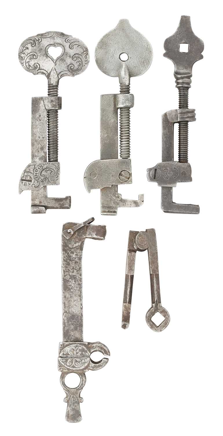 Lot 81 - A COMBINED SPRING CLAMP, SPANNER AND TURNSCREW AND FOUR FURTHER TOOLS, 17TH/18TH CENTURY