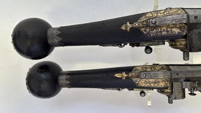 Lot 97 - A FINE AND RARE BRACE OF 40 BORE GERMAN SILVER-MOUNTED WHEEL-LOCK HOLSTER PISTOLS (PUFFERS)