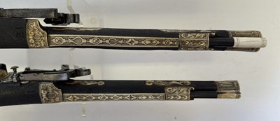 Lot 97 - A FINE AND RARE BRACE OF 40 BORE GERMAN SILVER-MOUNTED WHEEL-LOCK HOLSTER PISTOLS (PUFFERS)