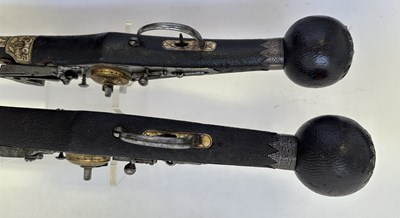 Lot 97 - A FINE AND RARE BRACE OF 40 BORE GERMAN SILVER-MOUNTED WHEEL-LOCK HOLSTER PISTOLS (PUFFERS)