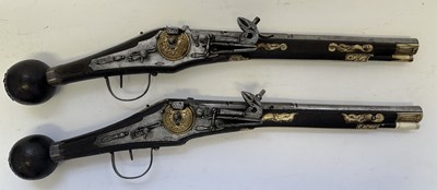 Lot 97 - A FINE AND RARE BRACE OF 40 BORE GERMAN SILVER-MOUNTED WHEEL-LOCK HOLSTER PISTOLS (PUFFERS)