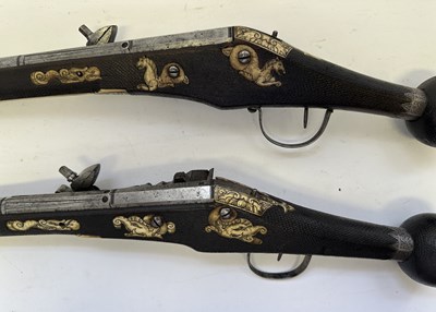 Lot 97 - A FINE AND RARE BRACE OF 40 BORE GERMAN SILVER-MOUNTED WHEEL-LOCK HOLSTER PISTOLS (PUFFERS)
