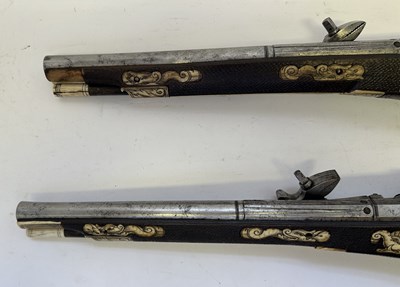 Lot 97 - A FINE AND RARE BRACE OF 40 BORE GERMAN SILVER-MOUNTED WHEEL-LOCK HOLSTER PISTOLS (PUFFERS)