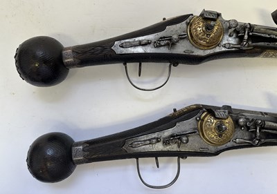 Lot 97 - A FINE AND RARE BRACE OF 40 BORE GERMAN SILVER-MOUNTED WHEEL-LOCK HOLSTER PISTOLS (PUFFERS)