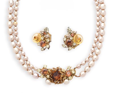 Lot 394 - MIRIAM HASKELL: IMITATION PEARL AND TOPAZ PASTE NECKLACE AND PAIR OF EAR CLIPS, 1950s