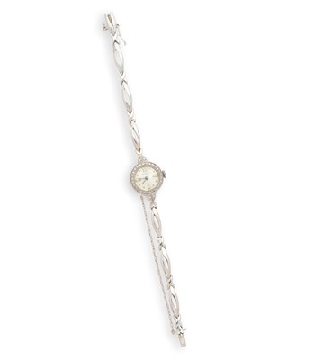 Lot 303 - BUCHERER: LADY'S GOLD AND DIAMOND COCKTAIL WATCH, 1960s