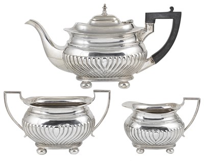 Lot 399 - A GEORGE V SILVER THREE-PIECE TEA SET