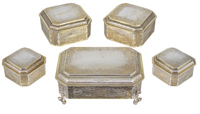 Lot 409 - A SET OF FIVE GEORGE V SILVER-GILT TOILET BOXES