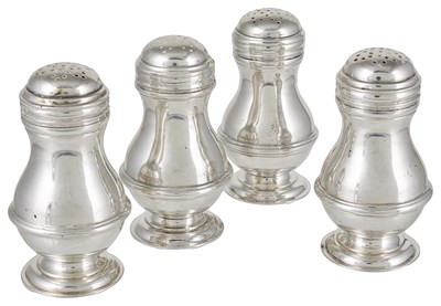 Lot 410 - A SET OF FOUR SILVER BUN PEPPERS