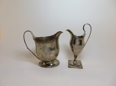 Lot 435 - TWO GEORGE III SILVER MILK JUGS