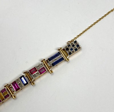 Lot 440 - GOLD, GEM-SET AND DIAMOND NAUTICAL FLAG BRACELET, 1920s