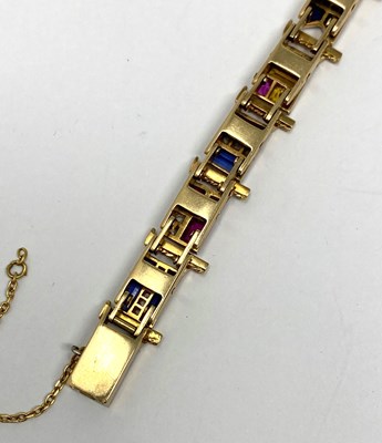 Lot 440 - GOLD, GEM-SET AND DIAMOND NAUTICAL FLAG BRACELET, 1920s
