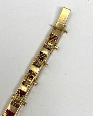 Lot 440 - GOLD, GEM-SET AND DIAMOND NAUTICAL FLAG BRACELET, 1920s