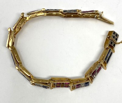 Lot 440 - GOLD, GEM-SET AND DIAMOND NAUTICAL FLAG BRACELET, 1920s