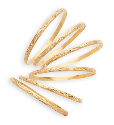 Lot 330 - SIX GOLD BANGLES