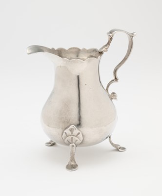Lot 155 - A GEORGE II SILVER MILK JUG, MAKER'S MARK RUBBED ?.H, LONDON, 1749