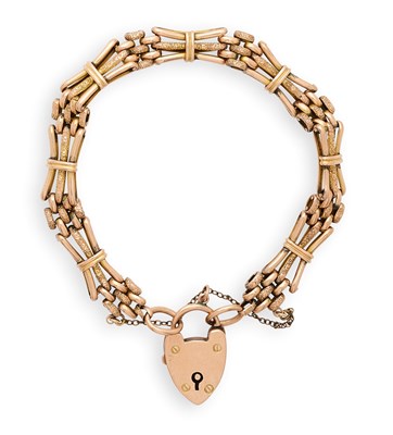 Lot 353 - EDWARDIAN GOLD GATE LINK BRACELET, 1908