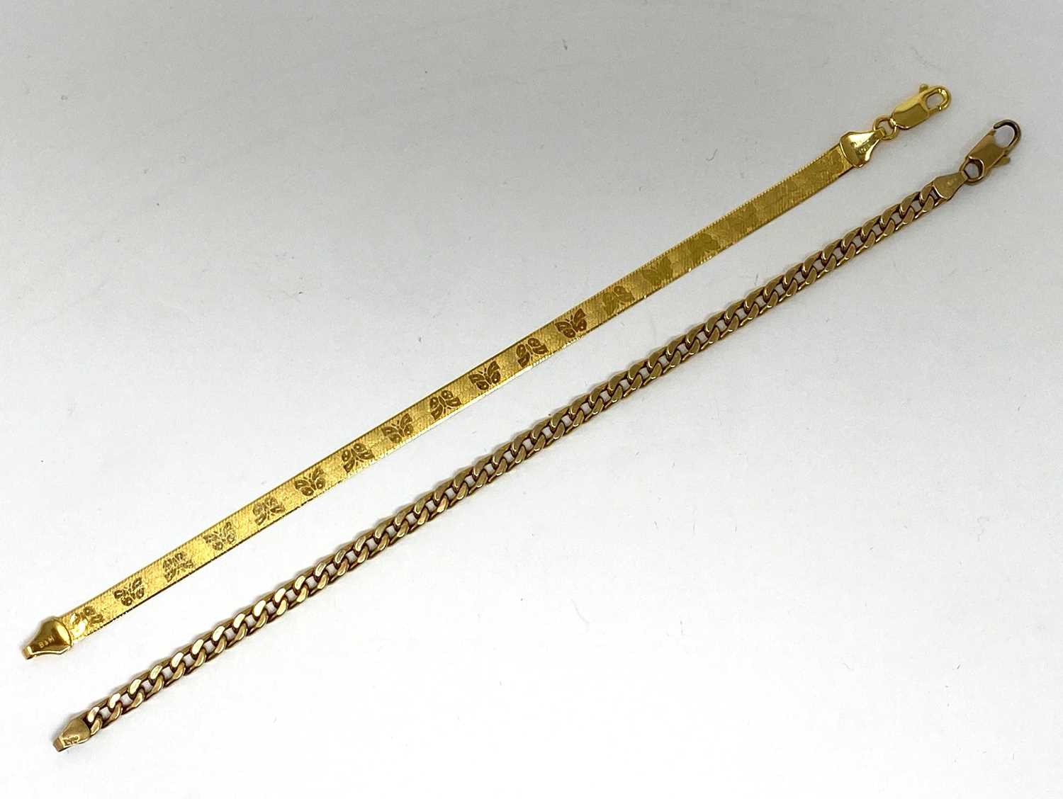 Lot 354 - TWO GOLD BRACELETS