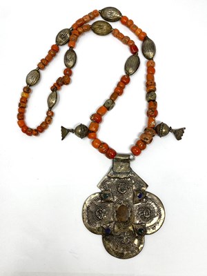 Lot 340 - CORAL, SILVER, AND GLASS PENDENT NECKLACE, MOROCCO, EARLY 20TH CENTURY