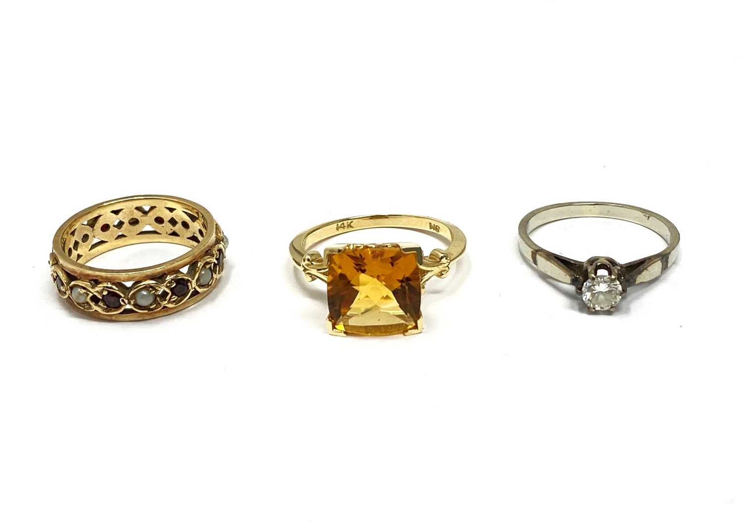 Lot 360 - THREE GEM-SET RINGS