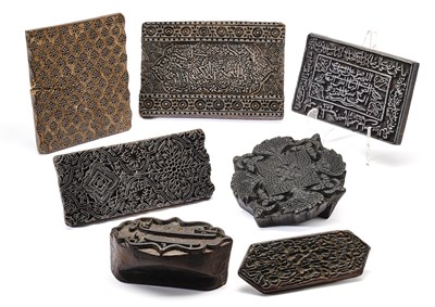 Lot 156 - SIX ISLAMIC WOOD PRINTING BLOCKS AND A CALLIGRAPHIC PLAQUE, PERSIA, 19TH CENTURY
