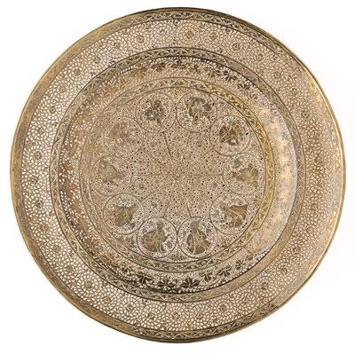 Lot 99 - A QAJAR PIERCED COPPER GILT DISH, PERSIA, 19TH CENTURY