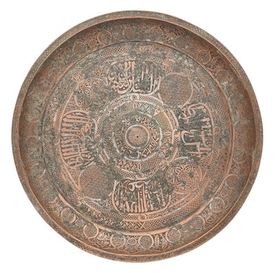 Lot 102 - A TIMURID ENGRAVED TINNED COPPER TRAY WITH SIGNS OF THE ZODIAC, PERSIA, 15TH CENTURY
