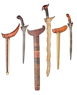 Lot 509 - A MORO KRIS AND TWO JAVANESE KRIS, 19TH CENTURY AND LATER