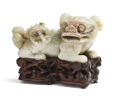 Lot 80 - A CHINESE CELADON JADE LION AND CUB