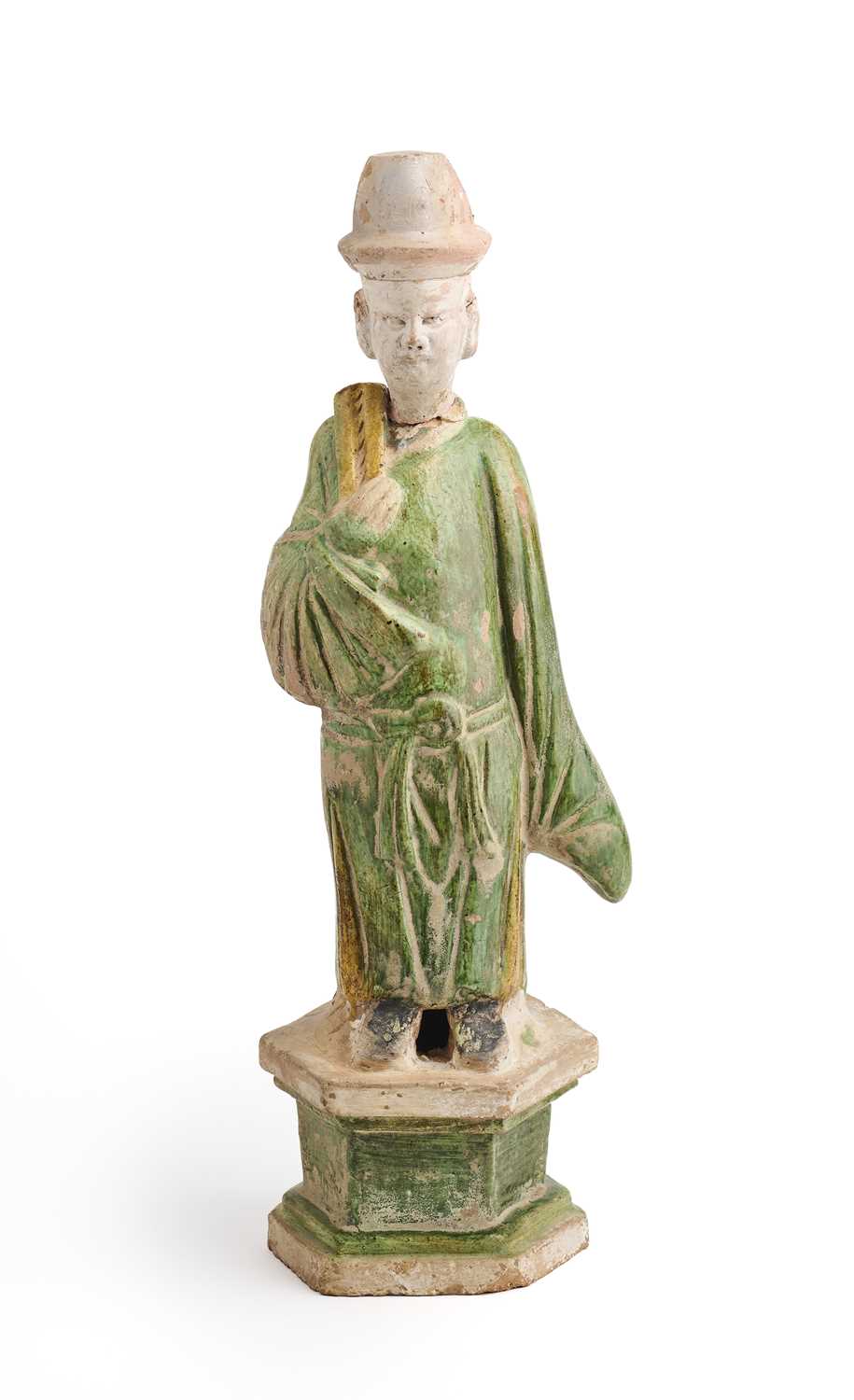 Lot 57 - A CHINESE GREEN AND AMBER-GLAZED ATTENDANT, MING DYNASTY, 15/16TH CENTURY