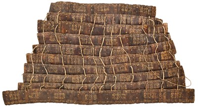 Lot 506 - A RARE EAST TIBETAN LEATHER LAMELLAR SKIRT FROM AN ARMOUR, 15TH/17TH CENTURY