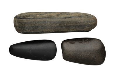 Lot 590 - THREE STONE AXE HEADS