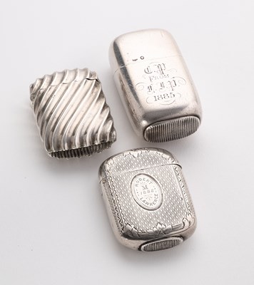 Lot 43 - THREE VICTORIAN SILVER VESTA CASES, BIRMINGHAM, 1881 / 83 / 88