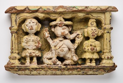 Lot 361 - A CARVED AND PAINTED WOOD RELIEF DEPICTING GANESHA, GUJARAT, WESTERN INDIA, 19TH CENTURY