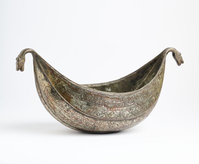 Lot 350 - A QAJAR TINNED COPPER KASHKUL, PERSIA, 19TH CENTURY