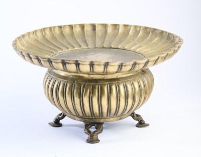 Lot 323 - A BRASS FOOTED BASIN, INDIA, 18TH/19TH CENTURY