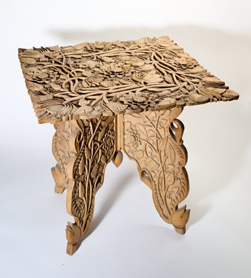 Lot 367 - AN ANGLO-INDIAN CARVED WOOD TABLE, 1920-30