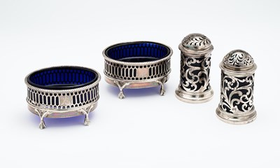 Lot 150 - A PAIR OF VICTORIAN PIERCED SILVER SALT CELLARS AND A PAIR OF PEPPERETTES