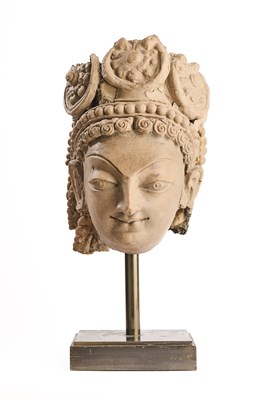 Lot 131 - A TERRACOTTA HEAD OF A BODHISATTVA, MARDAN-HUND REGION, PAKISTAN, CIRCA 9TH CENTURY