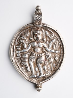 Lot 330 - A SILVER AMULETIC PENDANT DEPICTING BHAIRAVA, WESTERN INDIA, CIRCA 18TH CENTURY