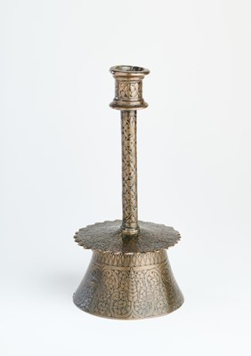 Lot 343 - A BRONZE CANDLESTICK, POSSIBLY VENETO-SARACENIC, 15TH CENTURY OR LATER