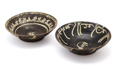 Lot 69 - TWO NISHAPUR SLIP PAINTED BOWLS, PERSIA, CIRCA 10TH CENTURY