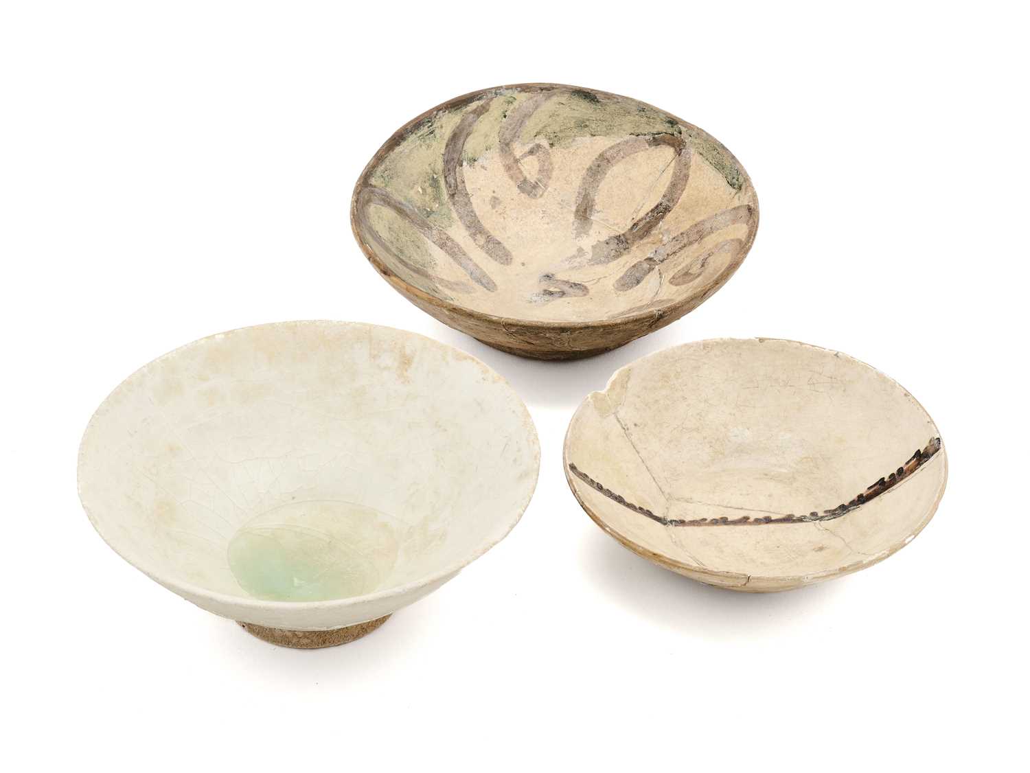 Lot 349 - THREE PERSIAN POTTERY BOWLS, 10TH-13TH CENTURIES