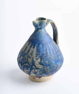 Lot 78 - TWO SMALL KASHAN MONOCHROME GLAZED EWERS, PERSIA, 12TH/13TH CENTURY